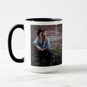 Chris Caffery Sitting by Brick Wall Mug