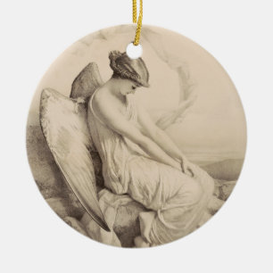 Christian angel sitting on a stone ceramic tree decoration