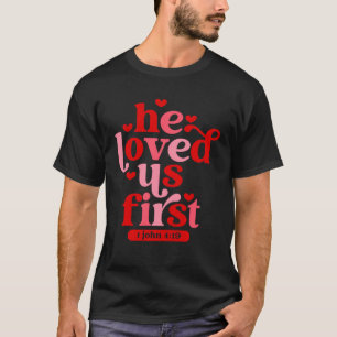 Christian He Loved Us First Bible Verse Pink Valen T-Shirt