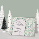 Christmas and New Year Calligraphy Winter Greenery Holiday Card<br><div class="desc">Merry Christmas and Happy New Year elegant typographic folded card. The design features handwritten script calligraphy and a pattern of winter greenery and berries. The wording inside is easy to personalise or you can of course leave it blank to handwrite on arrival.</div>