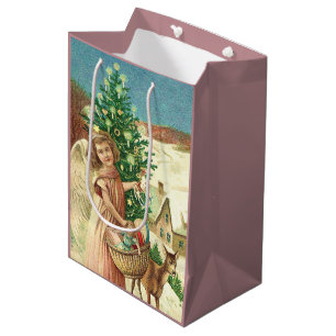 Christmas angel bringing toys medium gift bag