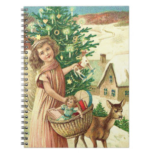 Christmas angel bringing toys notebook