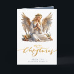 Christmas Angel Folded Photo Card<br><div class="desc">This traditional Christmas card features a beautiful angel with hands folded in prayer. Below are the words "Merry Christmas." You can personalise with your name. On the inside left you can add your favourite Christmas photo. On the inside right is a star with a greeting that reads "MAY THE MIRACLE...</div>