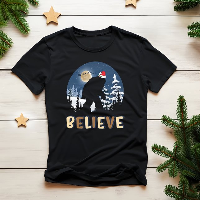 Christmas Believe Funny Bigfoot Ugly Xmas T-Shirt (Creator Uploaded)