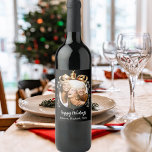 Christmas black gold bauble friends photo party wine label<br><div class="desc">Personalised Christmas Wine Bottle Labels – Perfect for Holiday Gatherings and Gifts Make your holiday celebrations extra special with these elegant, customisable wine bottle labels. Featuring a sleek black background and a festive golden Christmas tree bauble as a frame, these labels allow you to add a personal touch with your...</div>