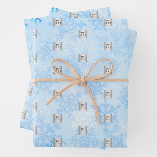 Christmas blue winter snowflakes business logo wrapping paper sheet (In situ)