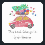 Christmas car - this book belongs to square sticker<br><div class="desc">Gorgeous red car in a watercolor and pencil style carries gifts and a Christmas tree. Celebrate the big day with "Christmas Tree Car". Winter Baby shower. Matching items available.</div>