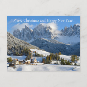 Christmas card with dolomite village in winter