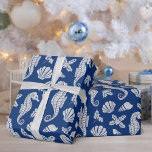 Christmas Coastal Seahorse Glitter Navy Blue Wrapping Paper<br><div class="desc">This beautiful coastal Christmas wrapping paper features a nautical ocean pattern of silver glitter seahorses, seashells, and holly sprigs on a navy blue background, for a festive beach holiday design. If you would like this design on more products or other colorways, or for other design-related enquiries, please contact me through...</div>