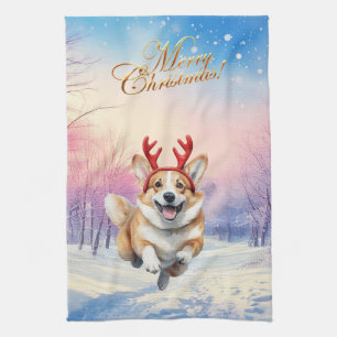 Christmas Corgi Reindeer antlers leaping in snow Tea Towel