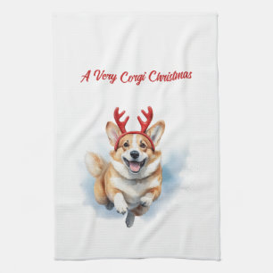 Christmas Corgi with Reindeer antlers leaping  Tea Towel