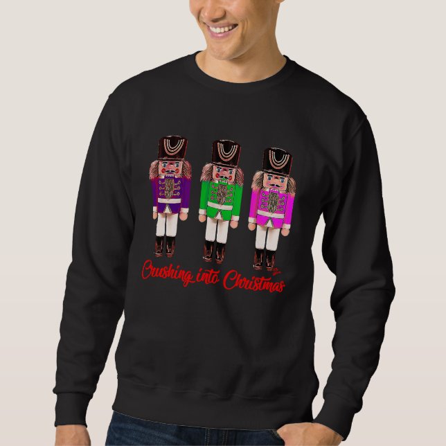 Christmas crushing into Christmas nutcracker Sweatshirt (Front)