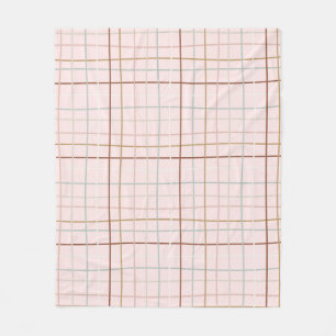 Christmas curved lines over pink fleece blanket