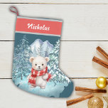 Christmas Cute Polar Bear In Winter Onederland Small Christmas Stocking<br><div class="desc">Personalised Winter Magic for Your Mantel – Celebrate the season with this enchanting "Winter ONEderland" Christmas stocking! With a gentle polar bear and a serene snowy backdrop of mountains and frosted trees, this stocking brings the tranquillity of winter right into your home. Add your loved one’s name in the banner...</div>