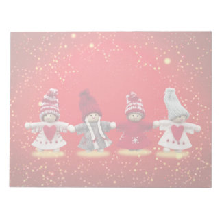 Christmas decorations on a red background notepad