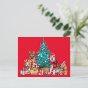 Christmas dog by tree postcard