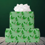 Christmas Dragon Santa Claus Wrapping Paper<br><div class="desc">Three cool. green Christmas Dragons flying around in red Santa hats. Their outstretched wings make them look like holiday holly. An awesome gift for a dragon item collector.</div>