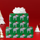 Christmas Elephant in Santa Hat Green Wrapping Paper<br><div class="desc">Cute Christmas elephant wrapping paper of a pretty elephant wearing a red santa hat on a green background. I love funny holiday animals.</div>
