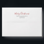 Christmas Envelope Modern Winter Wedding<br><div class="desc">A simple yet modern pre address envelope to match my Christmas wedding theme. The back flap features the words "Merry Christmas" in a trendy hand lettered script typography with your custom return address in classic sans font. The envelope opens to a complimentary solid berry red colour. Use the template fields...</div>