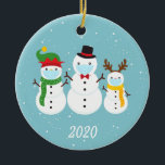 Christmas Face Mask Snowman Family 2020 Ceramic Tree Decoration<br><div class="desc">This design was created though digital art. It may be personalised in the area provided or customising by changing the photo or added your own words. Contact me at colorflowcreations@gmail.com if you with to have this design on another product. Purchase my original abstract acrylic painting for sale at www.etsy.com/shop/colorflowart. See...</div>