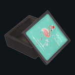 Christmas Flamingo Merry Christmas premium Jewellery Box<br><div class="desc">Stylish design with a retro touch featuring a festive pink flamingo wearing a red Santa hat, stars and palm trees decorated with baubles set against an aqua background. A customisable design for you to personalise with your own text, images and ideas. An original digital art image created by Quirky Chic....</div>