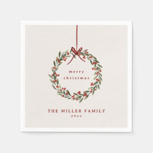 Christmas foliage wreath with red bow  napkin