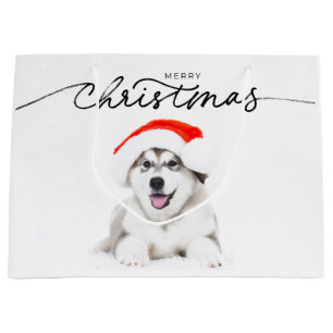 CHRISTMAS GIFT BAG WITH HUSKY PUPPY IN SANTA HAT