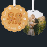 Christmas Gingerbread Couple Photo Snowflakes Cute Tree Decoration Card<br><div class="desc">A Christmas design: a pair of cute little gingerbread figurines -a gingerbread man and woman - holding hands, on light brown background, surrounded by arched text with white snowflakes between words. The message above is Peace Love Joy, below there is the names and year. On the back there is a...</div>