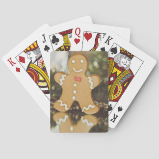 Christmas gingerbread man playing cards