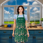 Christmas gnomes farmhouse name script green apron<br><div class="desc">Green background with a traditional Scandinavian style Christmas farmhouse decor,  gnomes,  wood logs, pine trees. Text. Merry Christmas.  Personalise and add a name.  White text.</div>