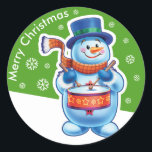 Christmas green round sticker Snowman drummer.<br><div class="desc">Christmas green round sticker Snowman drummer. and other Snowfolk. Winter Wonderland snowmen. Loveable wintery snowmen and snowgirl characters playing their instruments in a Christmas band. Also check out the matching loveable wintery characters with skating penguins, sledging snowgirls, skiing snowmen and skating snowmen : ) A lovely illustrated original sticker to...</div>