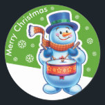 Christmas green round sticker Snowman drummer.<br><div class="desc">Christmas green round sticker Snowman drummer. and other Snowfolk. Winter Wonderland snowmen. Loveable wintery snowmen and snowgirl characters playing their instruments in a Christmas band. Also check out the matching loveable wintery characters with skating penguins, sledging snowgirls, skiing snowmen and skating snowmen : ) A lovely illustrated original sticker to...</div>
