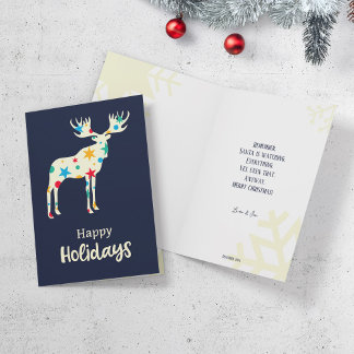 Christmas greeting card featuring a moose.
