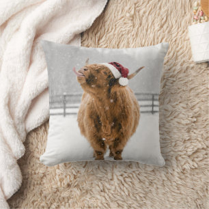 Christmas Highland Cow Licking Snowflakes Cushion
