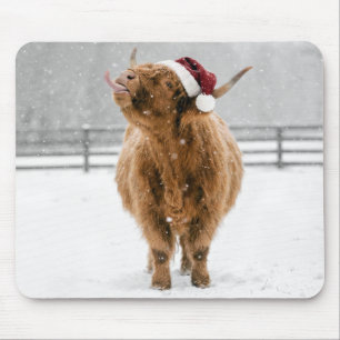 Christmas Highland Cow Licking Snowflakes Mouse Pad