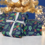 Christmas holly and pine cones pattern wrapping pa wrapping paper<br><div class="desc">Christmas holly with red berries and pine cones in a seamless pattern on a blue background.</div>