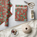 Christmas holly and pinecones seamless pattern wrapping paper<br><div class="desc">Christmas holly and pinecones in a seamless pattern with a dark-red background.</div>