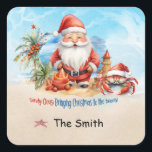 Christmas in July at the beach  Square Sticker<br><div class="desc">Experience the magic of Christmas in the middle of summer at the beautiful beach Square Sticker! Embrace the joy and excitement of the holiday season, even when the weather is warm and sunny. Celebrate Christmas in July with your loved ones and create unforgettable memories by the seaside. Spread the festive...</div>
