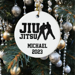 Christmas Jiu Jitsu Personalised  Ceramic Tree Decoration<br><div class="desc">This design was created though digital art. It may be personalised in the area provided or customising by changing the photo or added your own words. Contact me at colorflowcreations@gmail.com if you with to have this design on another product. See more of my creations or follow me at www.facebook.com/colorflowcreations, www.instagram.com/colorflowcreations,...</div>