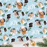 Christmas Joy Snowflake Photo Collage Pastel Blue Wrapping Paper<br><div class="desc">'Wishing you joy' fun and stylish gift wrap! An editable template, personalised with six photos of your family, friends or pets. You can also include the recipient's name, your family name or the holiday year. A seamless pattern with snowball framed photographs, festive leaves, berries, snow, snowflakes and stars. Custom gift...</div>