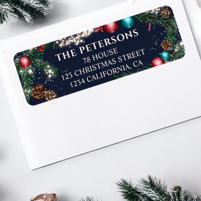 Christmas lights pine branches snow blue festive (Christmas lights pine branches snow blue festive label)