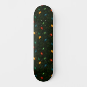 Christmas lights wrapped in holly leaves patterned skateboard