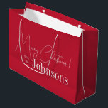 Christmas Merry Christmas Modern Red  Large Gift Bag<br><div class="desc">This is a modern, Merry Christmas design. It is in festive red and white and has the message, "Merry Christmas! from the Johnsons". Ideal for your Christmas gift giving, and ideal for your celebration party favours this festive season. To personalise, simply add your name in the personalise this text box....</div>