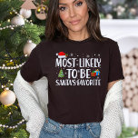 Christmas Most Likely To Be Santa's Favourite Funn T-Shirt<br><div class="desc">Are you convinced that you've secured the top spot on Santa's "Nice List" year after year? Do you have a knack for spreading joy,  kindness,  and holiday cheer? Embrace your belief in your status as Santa's favourite with our "Most Likely To Be Santa's Favourite" Funny Christmas T-Shirt.</div>