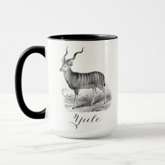 Christmas mug with antique deer etching says Yule.