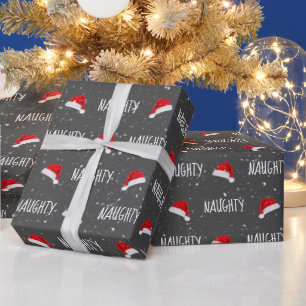 Christmas NAUGHTY Text with Santa Hats Wrapping Paper
