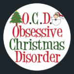 Christmas Obsession Classic Round Sticker<br><div class="desc">OCD. Obsessive Christmas Disorder. A funny Christmas sticker with a cute christmas tree and Santa Claus to decorate the words.</div>