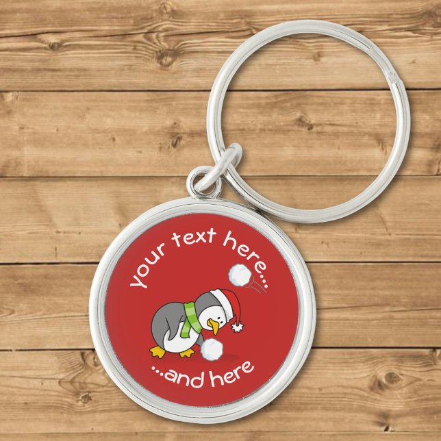 Christmas penguin getting a snow ball key ring (Creator Uploaded)