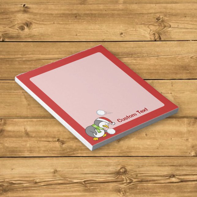 Christmas penguin getting a snow ball notepad (Creator Uploaded)