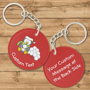 Christmas Penguin Sitting with Snow Balls Keychain